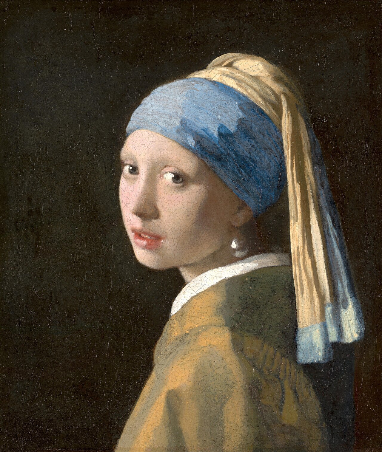 Johannes Vermeer, Girl with a Pearl Earring (c. 1665). Bilateral symmetry; smoothed, averaged-looking proportions.